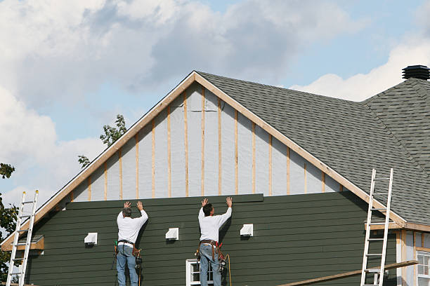 Professional Siding Installation technician working in Perkasie, PA
